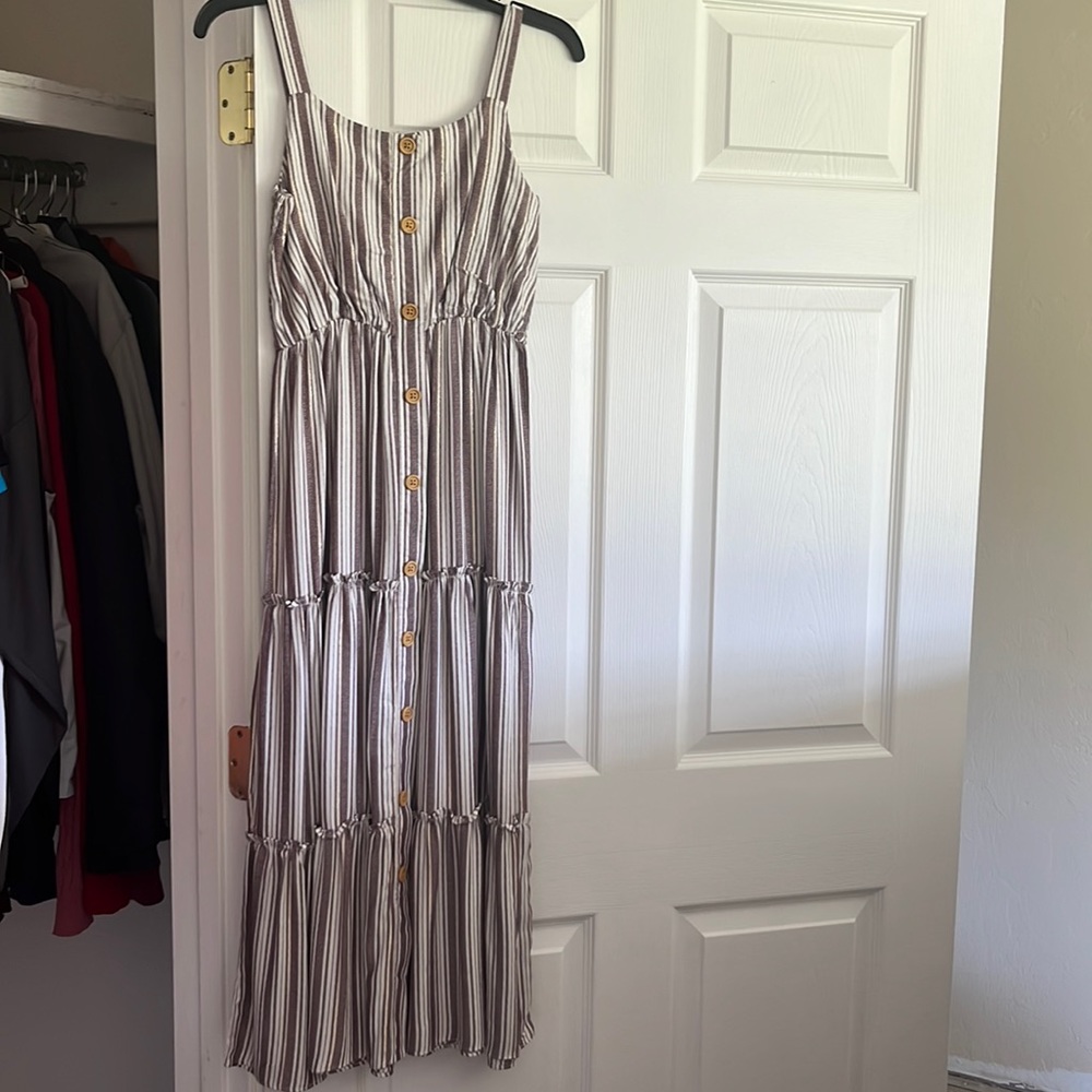 Detailed burgundy and white maxi dress with brown buttons